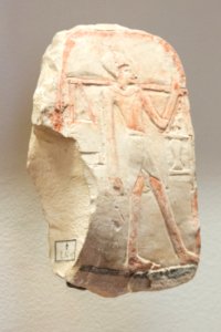 Relief présentant un homme portant une palanche - Louvre - E 5605 - 01