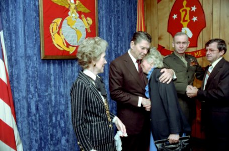 President Ronald Reagan consoles a mourner during Memorial Service for servicemen killed and wounded in Lebanon and Grenada