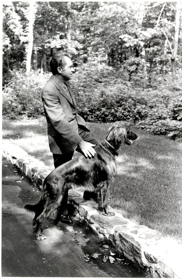 President Richard Nixon and Irish Setter King Timahoe at Camp David