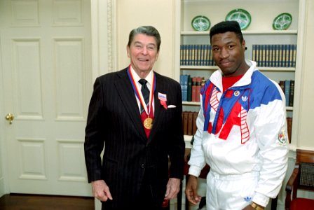 President Ronald Reagan During a Photo Op with Ray Mercer An 1988 Summer Olympic Athlete Gold Medalist in Boxing in The Oval Office photo