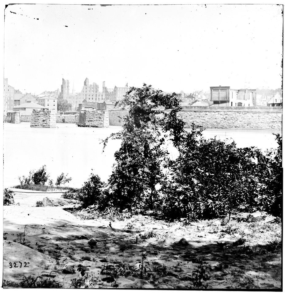 Ruins of mayos bridge the city beyond