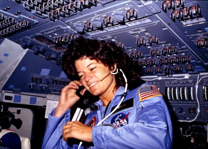 Sally Ride, America's first woman astronaut communicates with ground controllers from the flight deck - NARA - 541940 photo