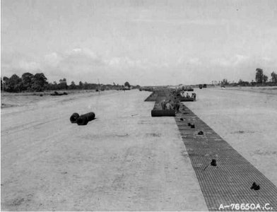 Saint-Pierre-du-Mont Airfield - 834th EAB engineers laying out the SMT