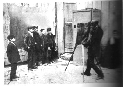 Scugnizzi (little street boys of Naples) and photographer - 1890s