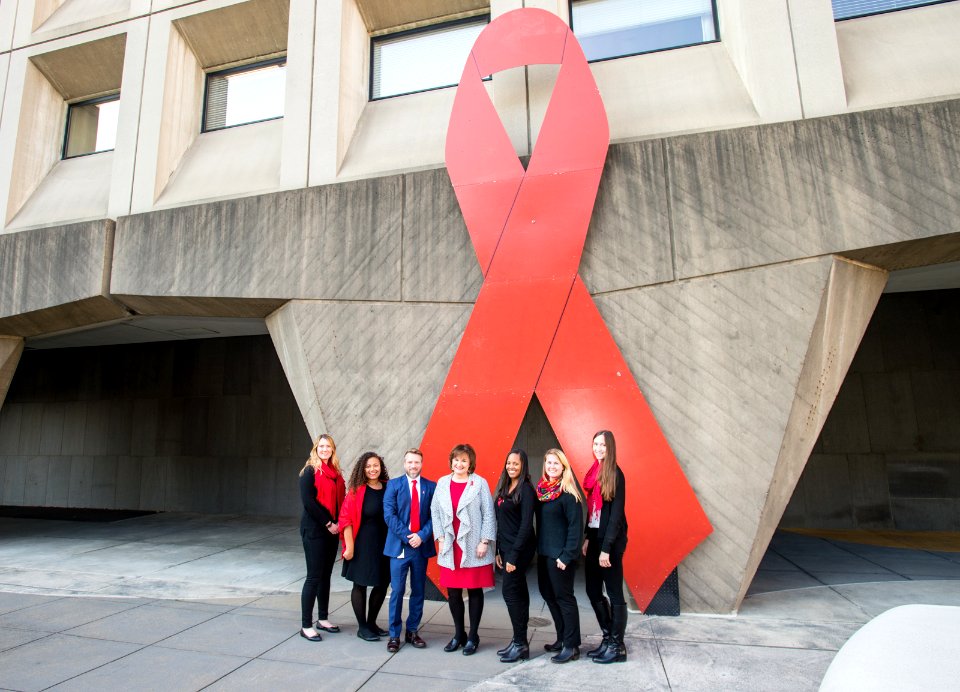 Secretary Carson and HOPWA with Word Aids Day Ribbon (24892209408)