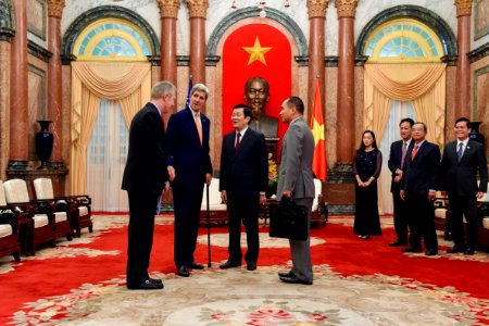 Secretary Kerry Introduces Ambassador Osius to Vietnamese President Sang at the Presidential Palace of Vietnam photo