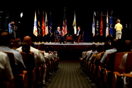 Secretary of Defense Chuck Hagel, center left, discusses current defense issues during a live interview with Jim Sciutto, the chief national security correspondent for CNN, at the U.S. Naval War College 140903-N-PX557-072