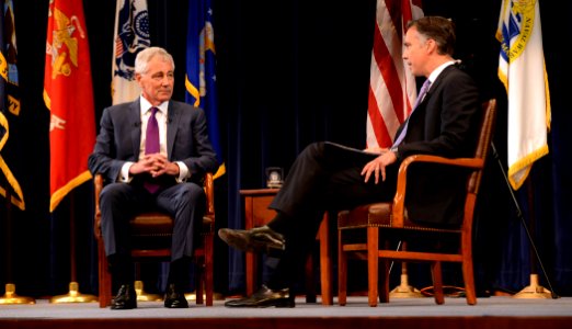 Secretary of Defense Chuck Hagel, left, discusses current defense issues during a live interview with Jim Sciutto, the chief national security correspondent for CNN, at the U.S. Naval War College in Newport 140903-N-PX557-039