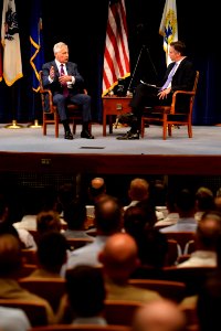 Secretary of Defense Chuck Hagel, center left, discusses current defense issues during a live interview with Jim Sciutto, the chief national security correspondent for CNN, at the U.S. Naval War College 140903-N-PX557-047