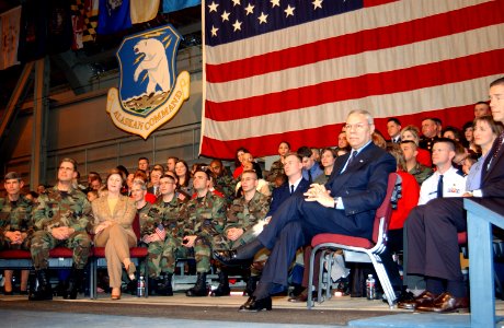 Secretary of State Colin Powell and First Lady Laura Bush watch as the President George W. Bush addresses a full house in Hangar 3 at Elmendorf Air Force Base