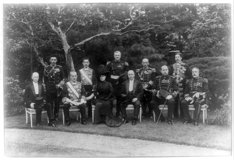 Secretary of State Philander Chase Knox with his wife, General Pershing and others, posed formally in a garden after the death of Mikado, Japan, Nov. 23, 1912 LCCN2010646657