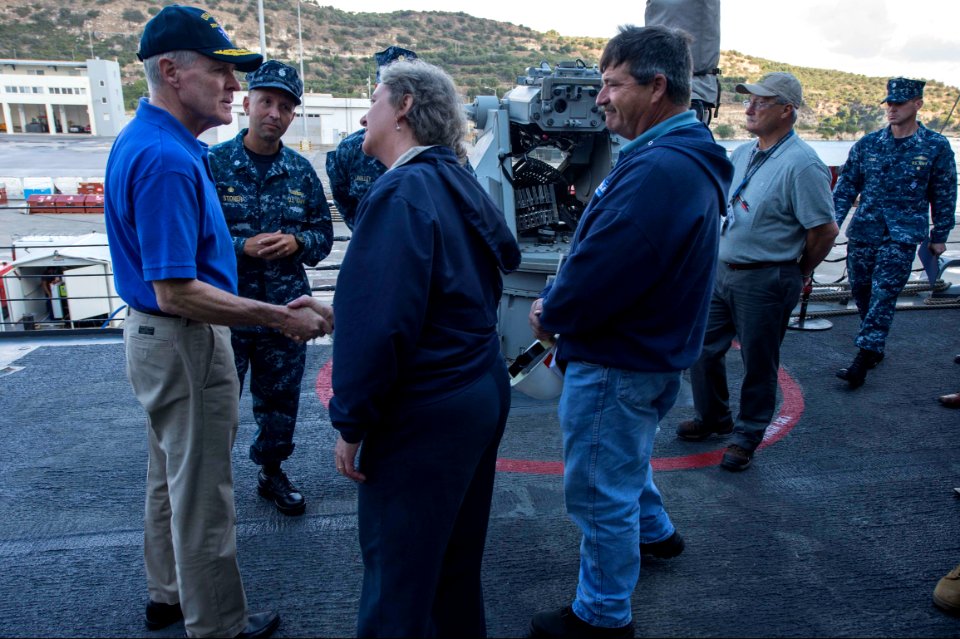 Secretary of the Navy Ray Mabus, left foreground, speaks with civilian contractors working aboard the guided missile destroyer USS Ramage (DDG 61) as U.S. Navy Cmdr. Dave Stoner, left background, the ship's 131115-N-VC236-083