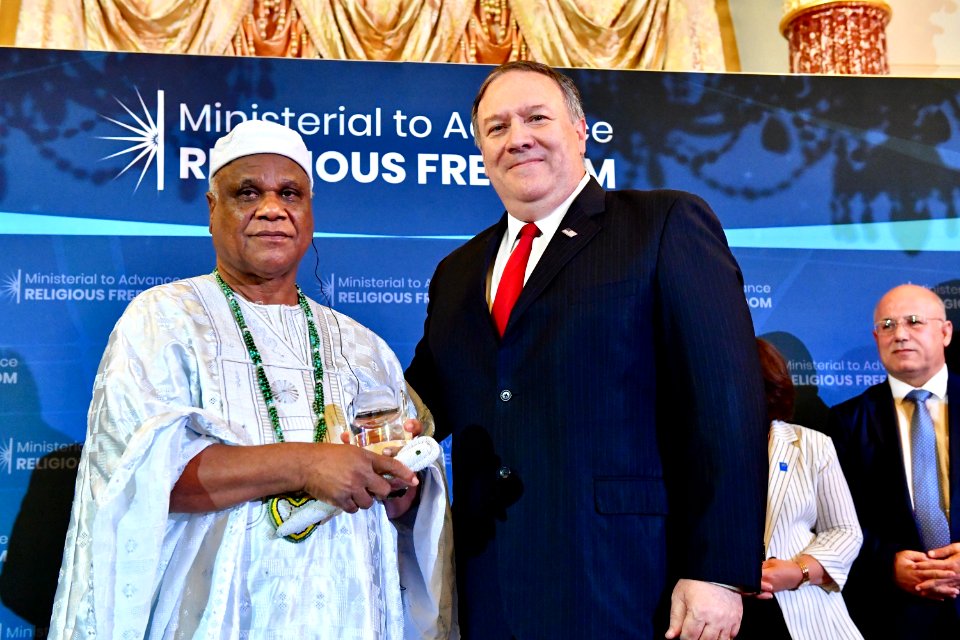 Secretary Pompeo Poses for a Photo With Ivanir dos Santos of Brazil
