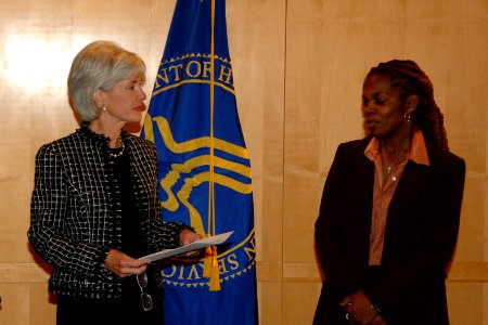 Secretary Sebelius with soon to be adoptive mother of Cameron Knowles (not pictured), MJ Kimberley Knowles