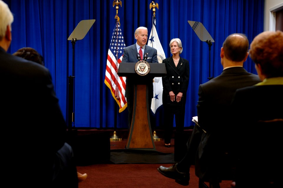 Secretary Sebelius looks on as Vice President Joe Biden delivers remarks on the Beacon Communities Grants that were made possible by the American Recovery and Reinvestment Act