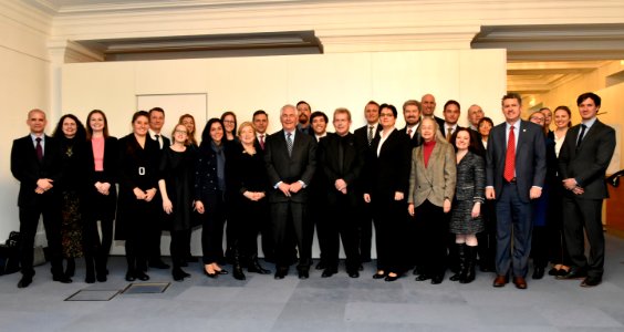 Secretary Tillerson Poses for a Photo With Tri-Mission Employees at OSCE