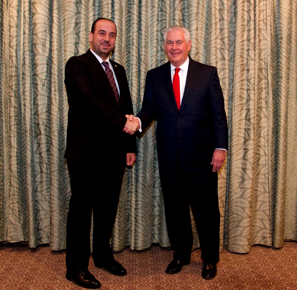 Secretary Tillerson Shakes Hands With Syrian Negotiations Commission President Dr. Al-Hariri