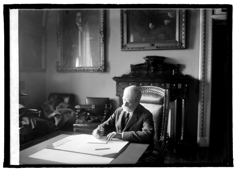 Secty. Hughes at desk LCCN2016846148