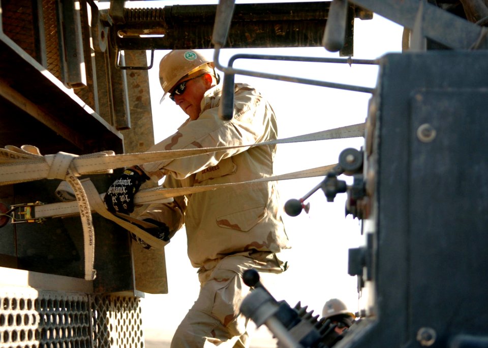 Securing water well rig 091205-N-AW868-071