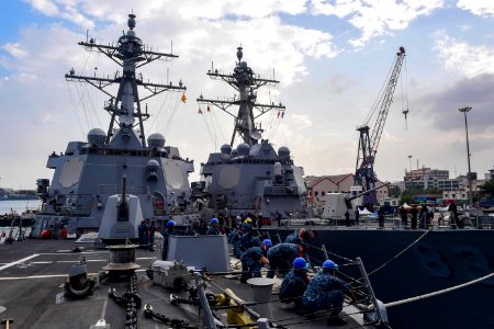 The Arleigh Burke-class guided-missile destroyers USS Kidd (DDG 100), left, and USS Howard (DDG 83) moor pierside in Chennai, India, during Malabar 2017 photo