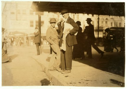 The average age of newsboys in New Orleans is very high. Many young men like these, and few little ones. LOC nclc.03925