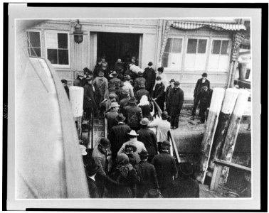 The Battery, New York - outside of barge office - landing of the emigrant passed from the ferry-boat which brings them from Ellis Island to the Battery LCCN96506927