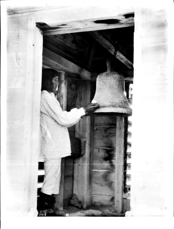 The bell ringer with his bell at the pueblo of Isleta, New Mexico, ca.1898 (CHS-3918)