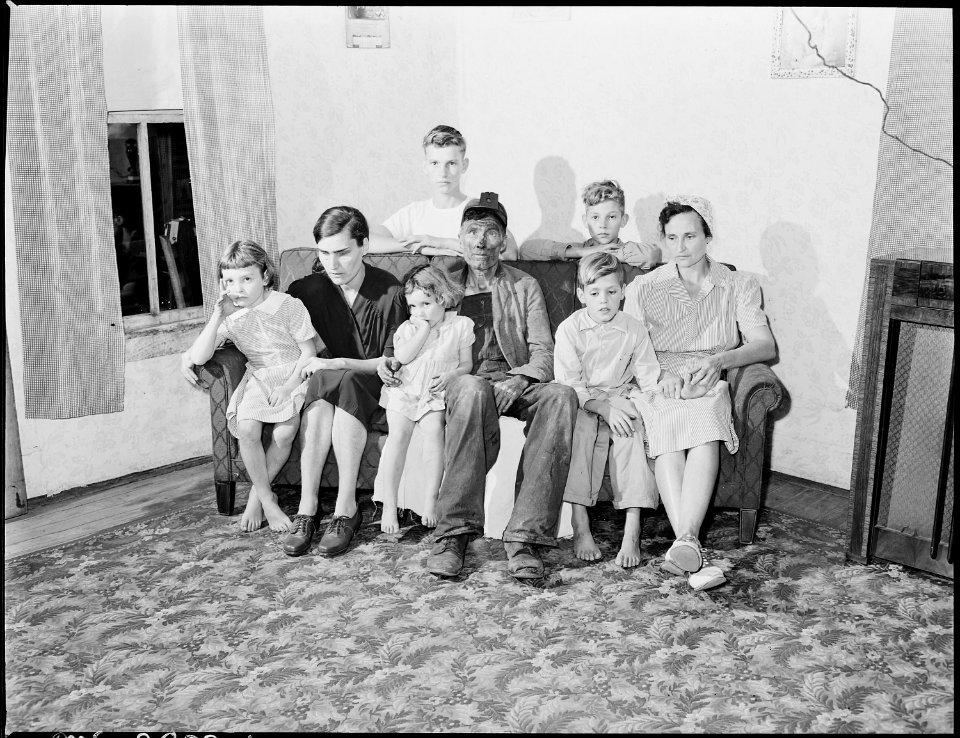 The Blaine Sergent family, reading from left to right, front row, Wanda Lee, Lucy, Bobbie Jean, Mr. Sergent, Donald... - NARA - 541377