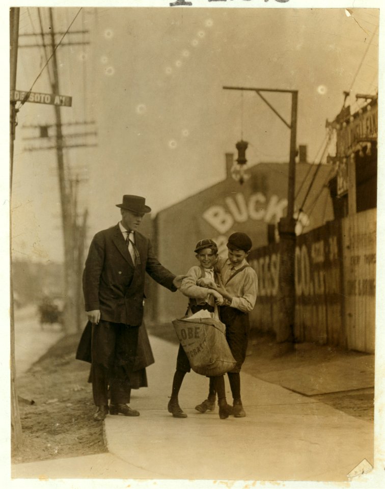 The boy with bags nicknamed Turk said he was going to Texas soon. The investigator found him recently with $1.75 he had just won at craps. N. Broadway and De Soto Sts.,. LOC nclc.03518