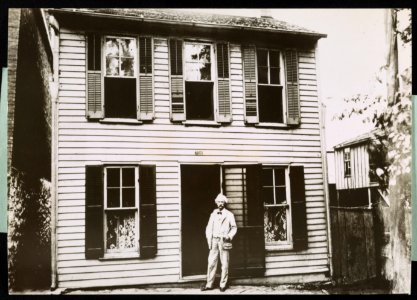 The boyhood home of the American writer Mark Twain was this gray house on Hill Street, Missouri, the house described as Tom Sawyer's home in Mark Twain's best known story, The Adventures of LCCN2007678786