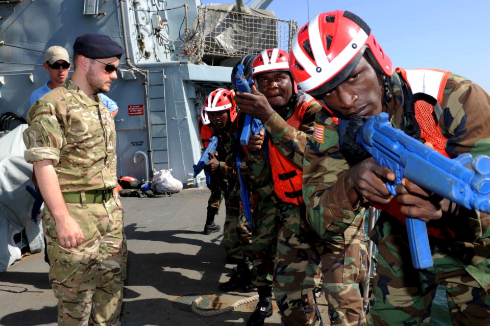 The British Royal Navy boarding officer for the frigate HMS Argyll (F 231) trains Liberian sailors aboard the Argyll during Saharan Express 2013 in Dakar, Senegal, March 9, 2013 130309-N-IY142-075
