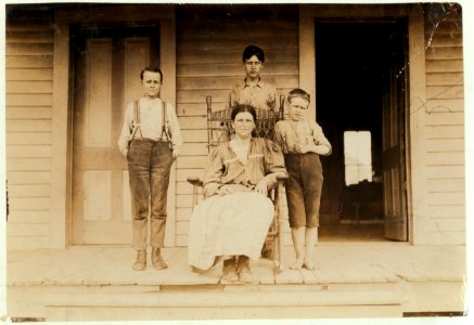 The Bush Family. Winona, (Miss.) Cotton Mills. The mother, a widow, and three children all work in the mill. Smallest boy, Louis, said he was 'going on 12.' Been here only a few months. LOC nclc.02115