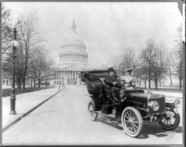 Sen. Benjamin Ryan Tillman & wife, in auto; Capitol in background LCCN2016647514