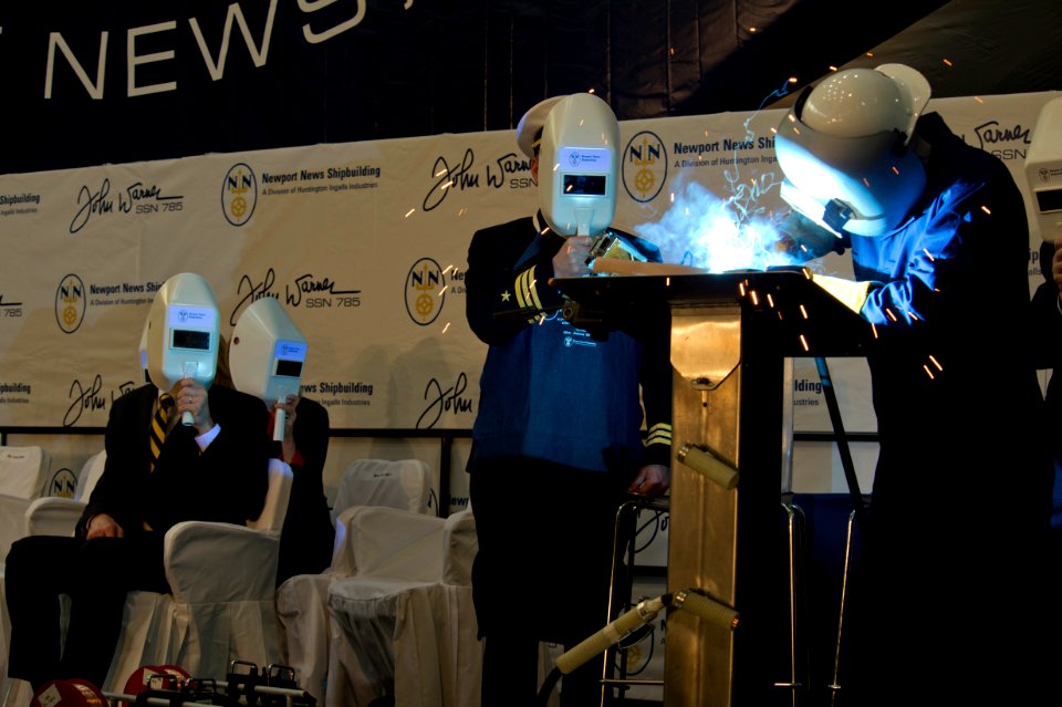 Sen. John Warner's initials are welded during the keel laying ceremony of the attack submarine PCU John Warner.. (8568755777)