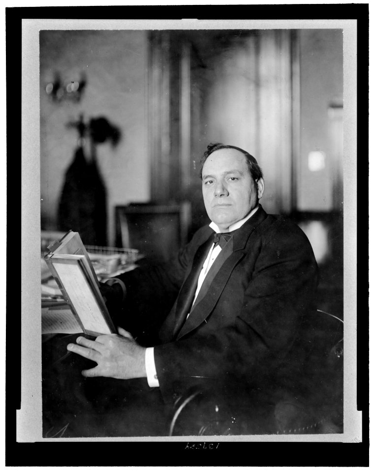 Senator Elmer J. Burkett, Senator from Nebraska, half-length portrait, seated, holding book LCCN2007684750