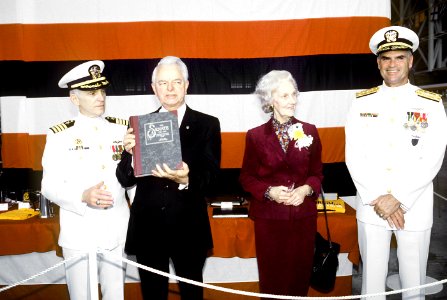 Senator Robert C. Byrd displays a gift presented to him at the commissioning ceremony of the nuclear-powered fleet ballistic missile submarine USS WEST VIRGINIA (SSBN-736)