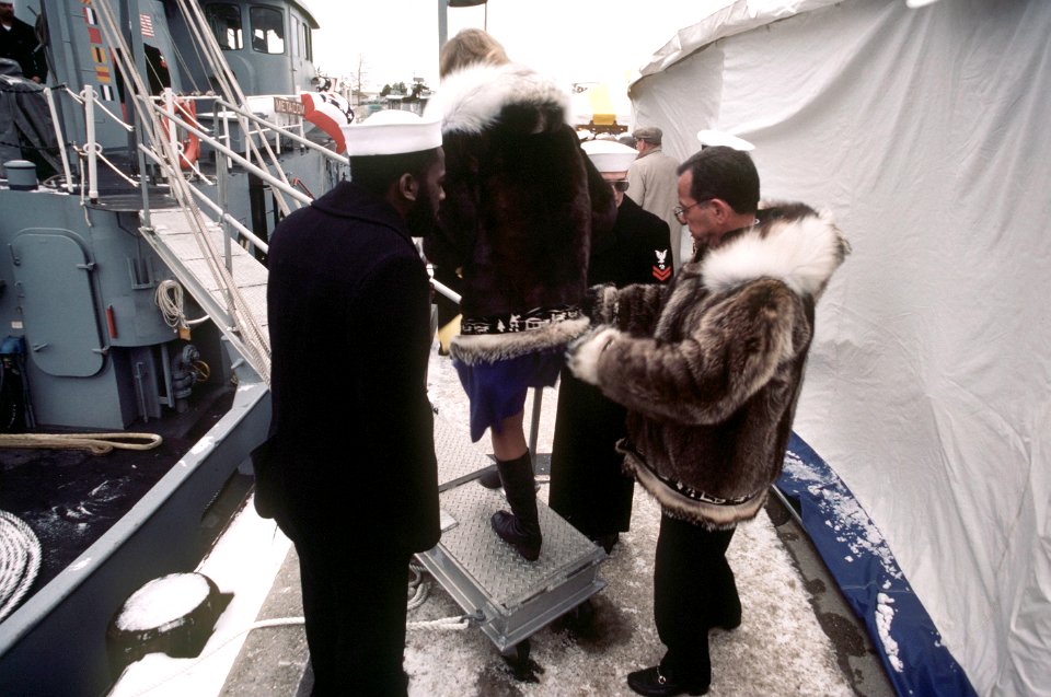 Senator Ted Stevens and his wife, Catherine, board a tug after the commissioning of the nuclear-powered strategic missile submarine USS ALASKA