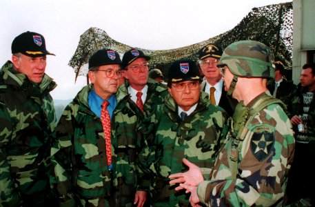 Senators Pat Roberts (R-KS), Ted Stevens (R-AK), Daniel K. Inouye (D-HI), Pete V. Domenici (R-NM), and Thad Cochran (R-MS) receive a briefing after a live fire demonstration at the Multiple Purpose Range Complex (MPRC)