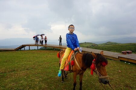 Children prairie horseback riding