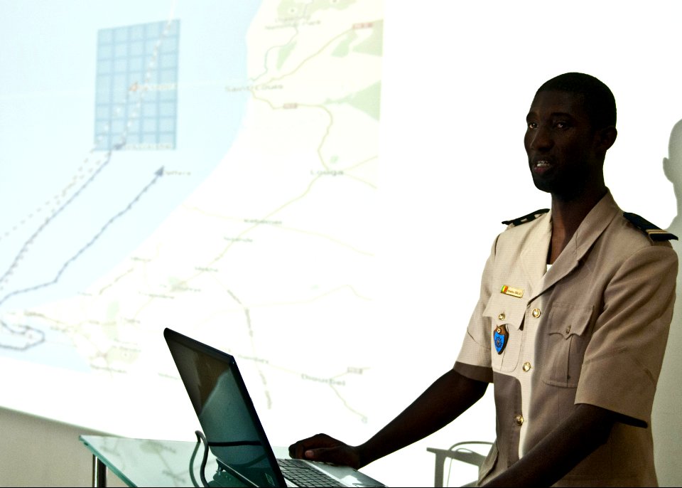 Senegalese National Navy Lt. j.g. Amadou Diallo gives a morning brief during Saharan Express 2014 in Dakar, Senegal, March 10, 2014 140310-N-QY759-020