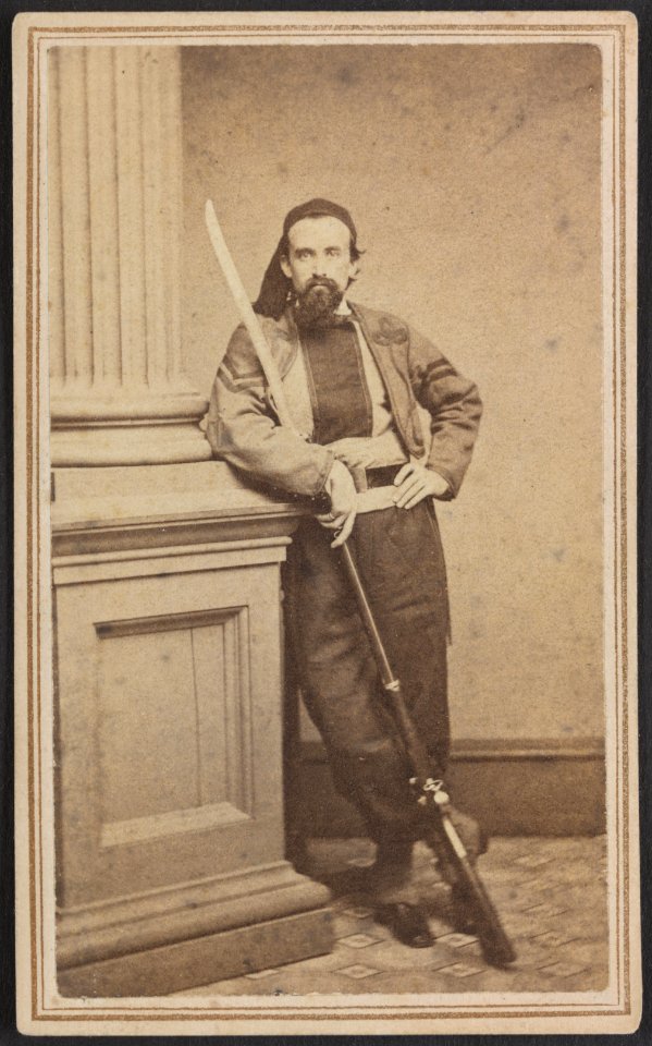 Sergeant Henry G. Lillibridge of Co. H, 10th Rhode Island Infantry Regiment, in zouave uniform with saber bayoneted rifle) - Frank Rowell, photographer, 25 Westminster St., Prov. R.I LCCN2013645641
