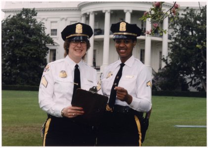 Sergeant Laurie Rich, white female, and Sherrine Freeman, minority female. (White House Police Officers) - NARA - 558657 photo