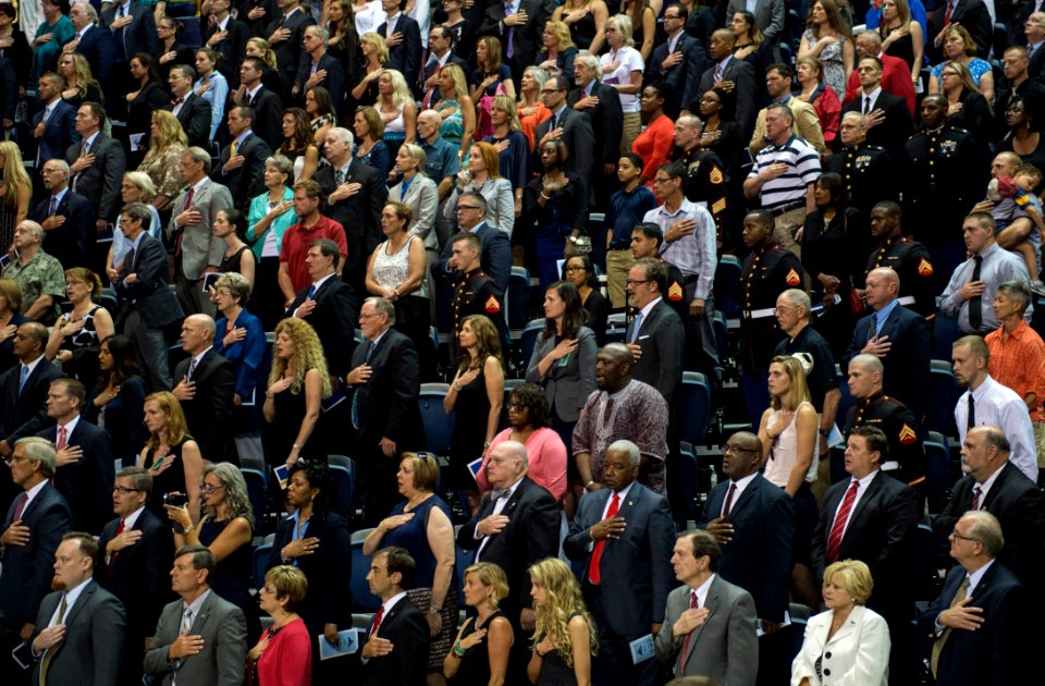 Service members and Chattanoogans hold their hands over their hearts as the national anthem is played during the memorial for the fallen. (20414438420)
