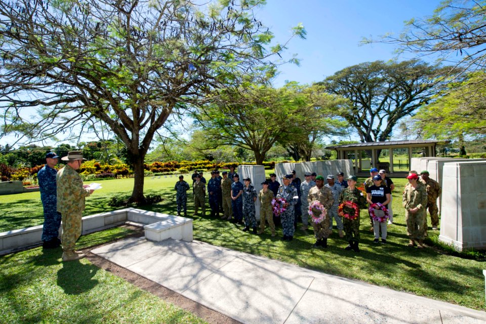 Service members render honors to fallen at the Rabaul War Cemetery 150707-N-BK290-034