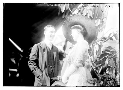 Seton Henry and Miss C. Harding. Three-quarter view, standing and talking to each other. LCCN2014688171