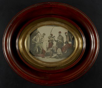 Seven unidentified soldiers in Union uniforms reenacting a battle scene LCCN2012647007