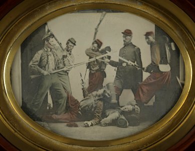 Seven unidentified soldiers in Union uniforms reenacting a battle scene LCCN2012647007 photo