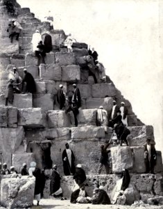 Several people gathered at the base of the Great Pyramid