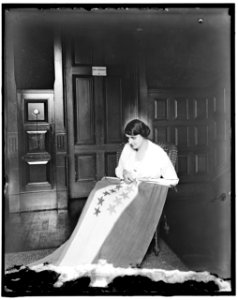 Sewing stars on suffrage flag LOC hec.14126