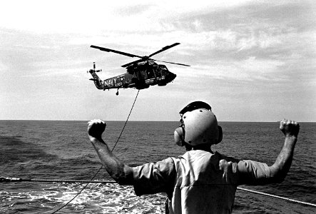 SH-2F Seaaprite of HSL-36 is refueld by USS Dewey (DDG-45) 1979